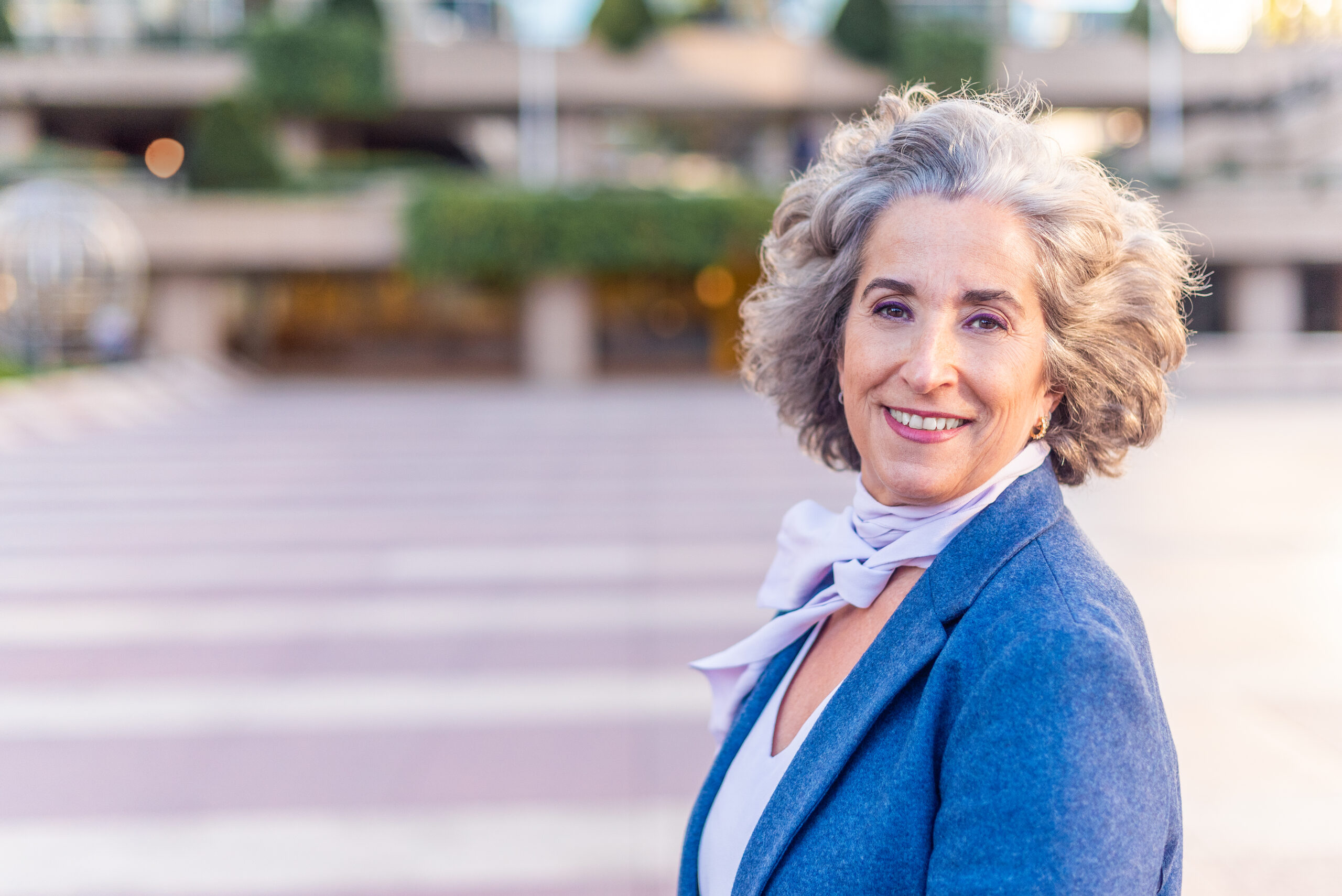 stylish adult woman smiling and looking at the camera